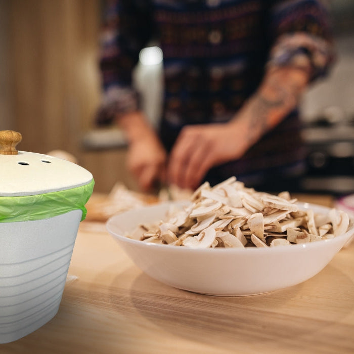 turning compost to improve airflow and reduce smells