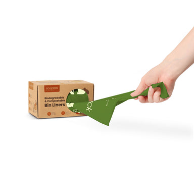 Pulling a bag from Ecopack 36L compostable bin liners with tie handle box