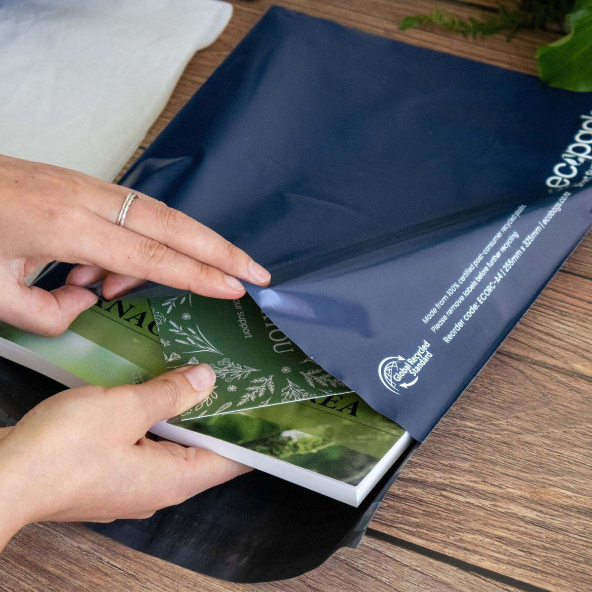 Ecopack A4 recycled mailing satchel in use