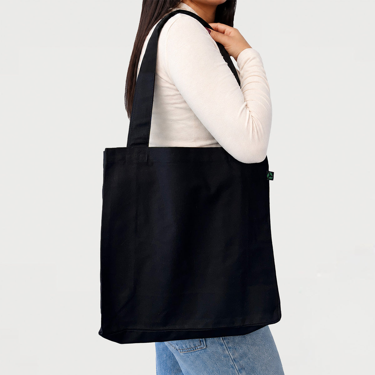 Model Carrying Ecobags Certified Organic Canvas Black Tote Bag with Gusset