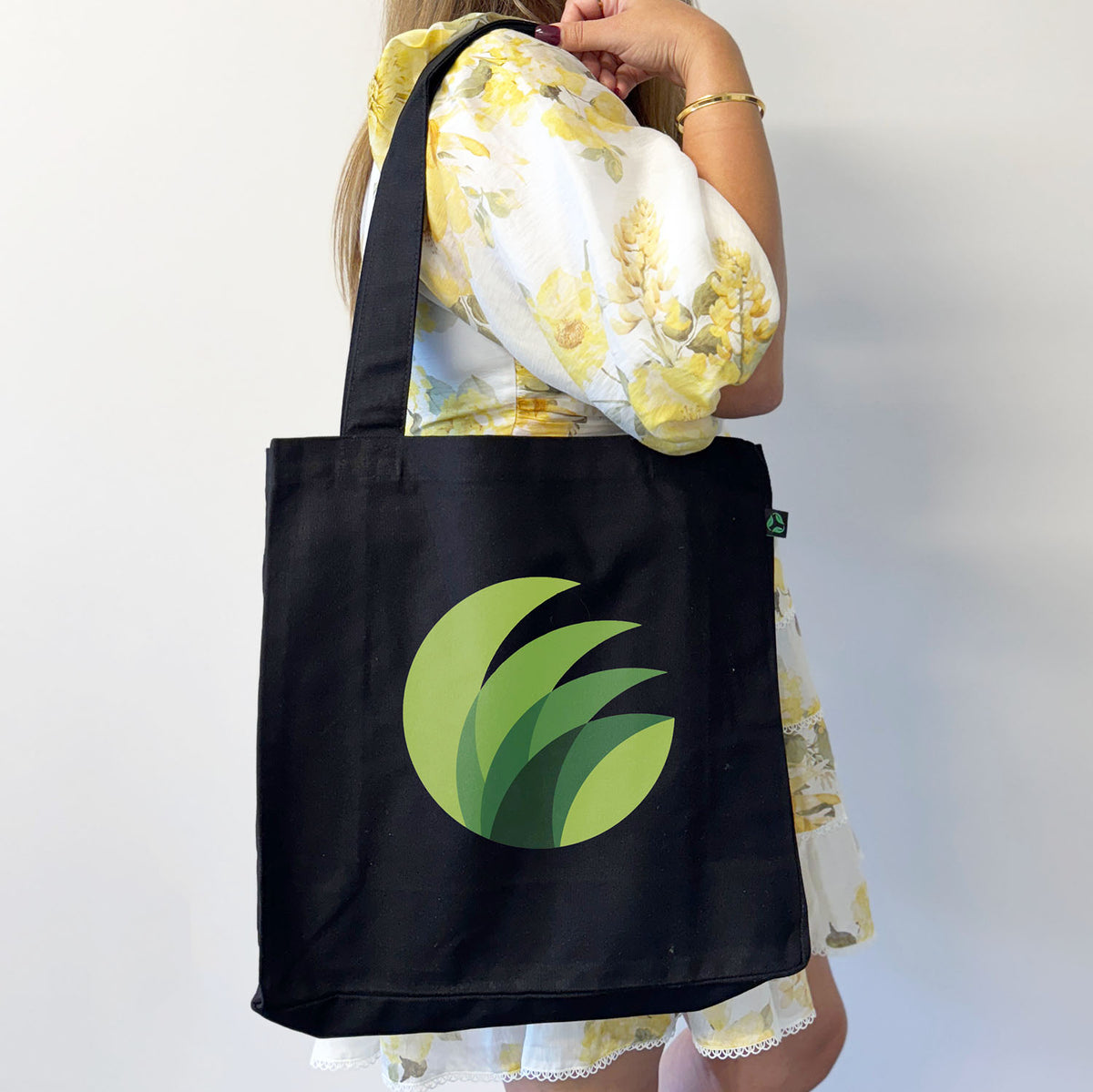 A Girl Carrying Certified Organic Canvas Black Tote Bag with Print