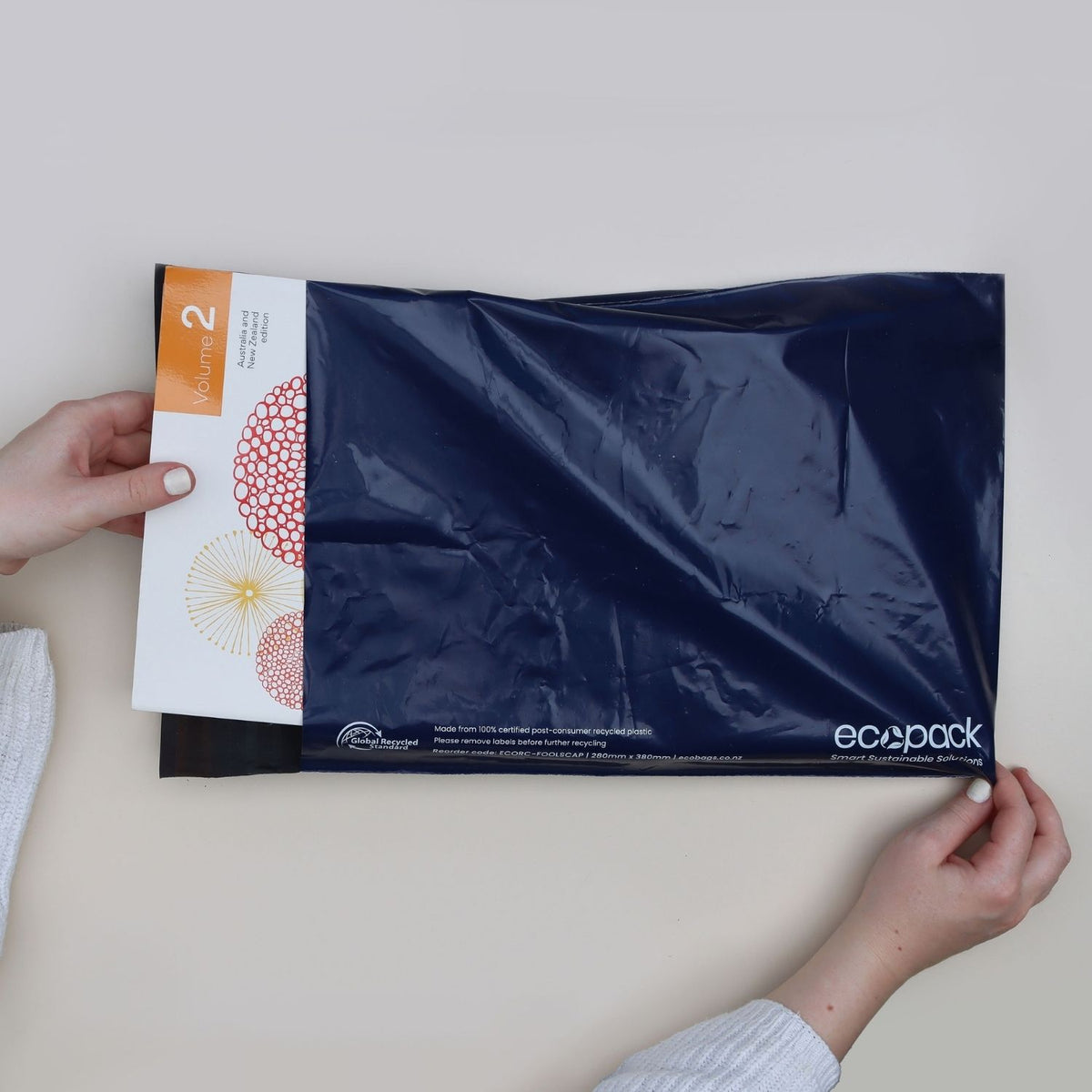 Ecopack Foolscap recycled mailing satchel in use